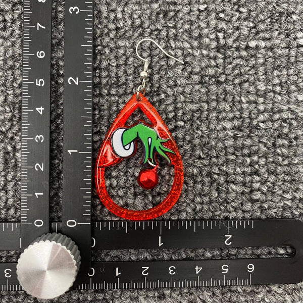 Mio Queena - Christmas Acrylic Grinch Holding Bell Red Drop Dangle Earrings