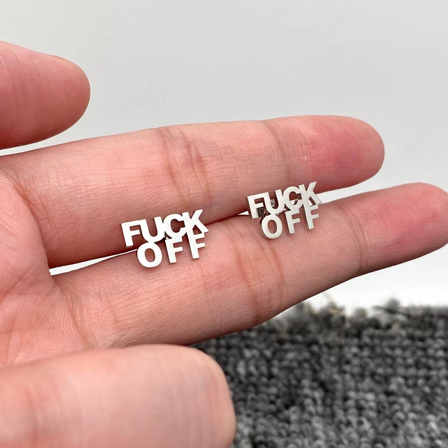 Mio Queena - 'FUCK OFF' Stainless Steel Ear Studs: Steel color
