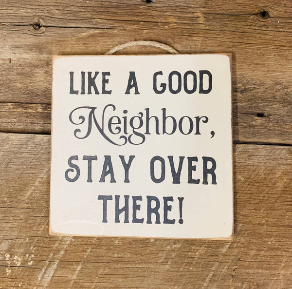 North Fork Mercantile - Like A Good Neighbor Stay Over There, Welcome Sign