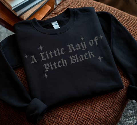 LITTLE RAY OF PITCH BLACK
