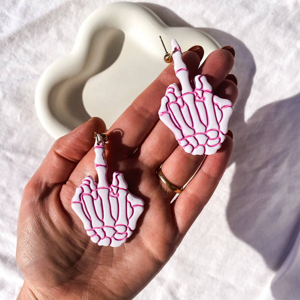 Blush and Bash Studio - Middle Finger Skeleton Earrings