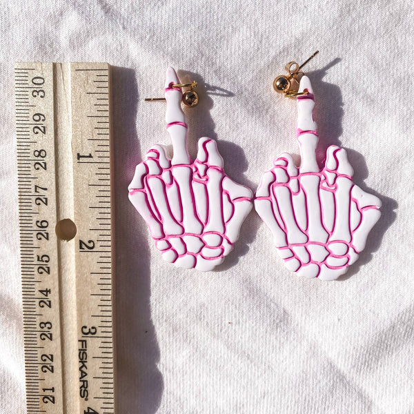 Blush and Bash Studio - Middle Finger Skeleton Earrings