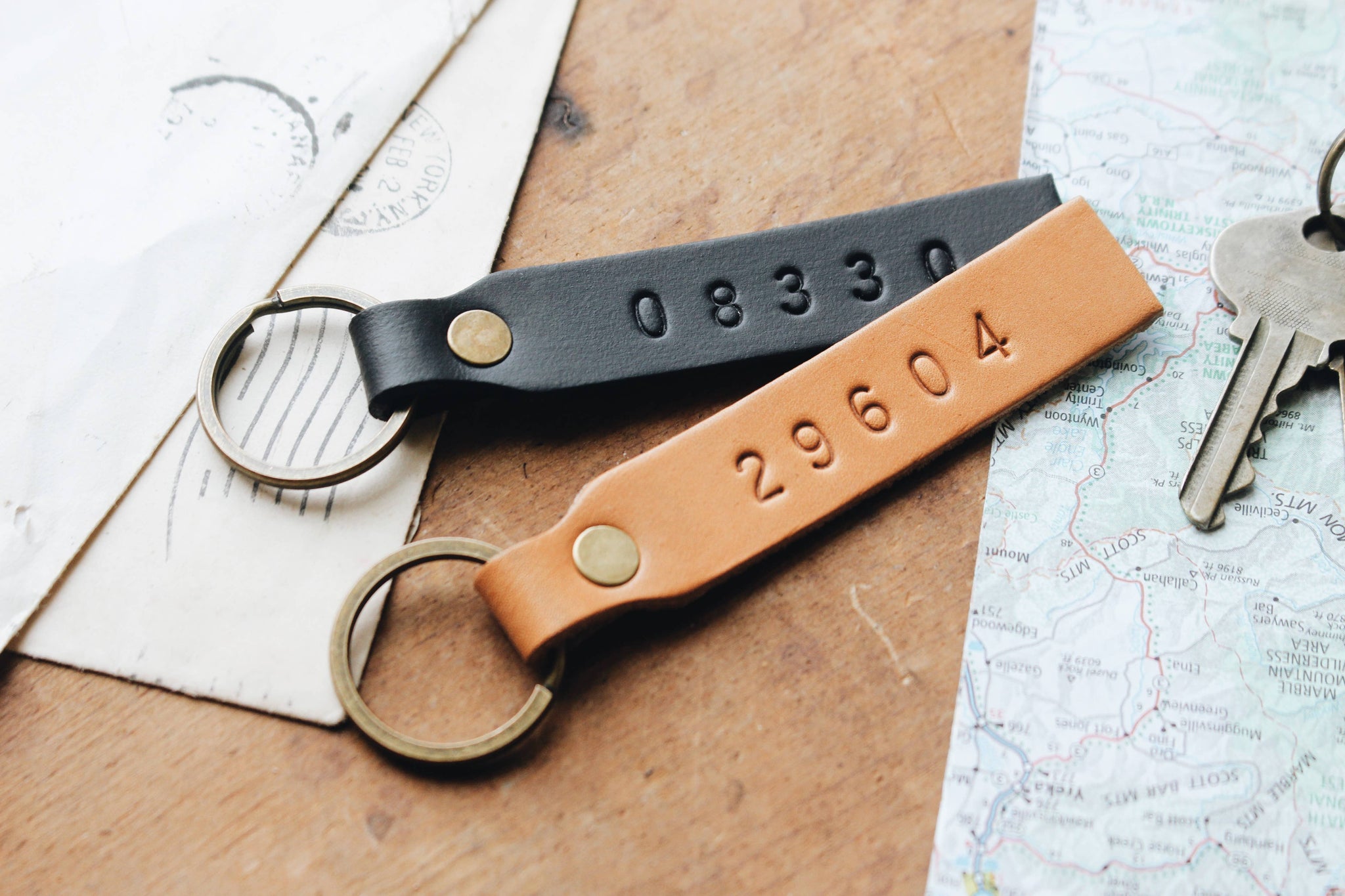 The Traveling Penny - Custom Zip Code Stamped Leather Keychain Key Fob