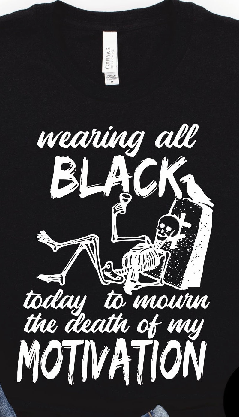 WEARING ALL BLACK TO MOURN THE DEATH OF MY MOTIVATION